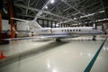 Private Hawker Beechcraft 4000 M-KENF standing in a hangar at Sheremetyevo international airport.