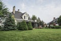 Private house and its garden under beautiful sky Royalty Free Stock Photo