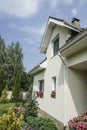 Private house and its garden under beautiful sky Royalty Free Stock Photo