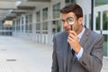 Private investigator looking through a magnifying glass Royalty Free Stock Photo