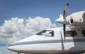 Private jet exterior against the blue sky. Airplane cockpit Royalty Free Stock Photo