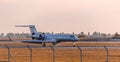 Airplane making landing on the runway Royalty Free Stock Photo