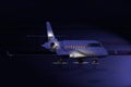 Private jet at night on the runway Royalty Free Stock Photo