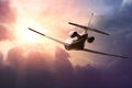 Private Jet PLane in the sky at sunset Royalty Free Stock Photo