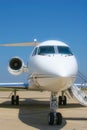 A private jet sits empty awaiting its next flight.