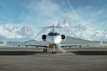 Private Jet waiting on runway with snowy mountains Royalty Free Stock Photo