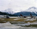 Private jets and helicopter in the snow covered landscape of St Moritz Switzerland Royalty Free Stock Photo