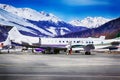 Private jets, planes and helicopters in the airport of St Moritz Switzerland in the alps Royalty Free Stock Photo