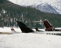 Private jets, planes and in the snow covered landscape of Switzerland Royalty Free Stock Photo