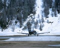 Private jets in the snow covered landscape of St Moritz Switzerland Royalty Free Stock Photo