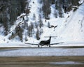 Private jets in the snow covered landscape of St Moritz Switzerland Royalty Free Stock Photo