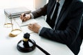 The private office workplace for consultant an young lawyer legislation with gavel and document on wood table, legal justice and Royalty Free Stock Photo