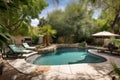 private pool and hot tub in secluded backyard oasis