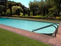 Private pool in a luxurious garden Royalty Free Stock Photo
