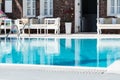 Private pool and sun loungers Royalty Free Stock Photo