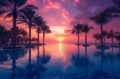 a private pool at sunset is lined with palm trees Royalty Free Stock Photo