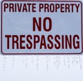 Private property sign with icicles. Royalty Free Stock Photo