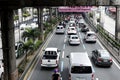 Private and public vehicles pass along a traffic congested major highway in Metro Manila