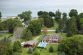 Private residential house in lakeside suburban sprawl area in Rochester, New York. Upscale suburban home with large Royalty Free Stock Photo