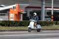 Private Scooter Motorcycle, Man on Old Vespa