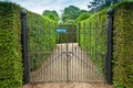 Private sign attached to an ornate wrought iron gate