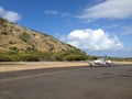 Private small plane landing on the island Royalty Free Stock Photo