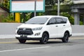 Private Toyota Kijang Innova car. on the highway in Tanjung Morawa, Sumatra, Indonesia & x28;agust 20, 2023& x29;.