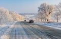 Private transport moving on a country slippery road at winter season