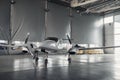 Private turbo-propeller airplane in hangar, nobody Royalty Free Stock Photo