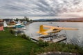 Private water airplanes parked in water airport on the lake in Alaska, Anchorage.