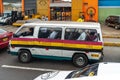 Private workers transport van in street, Lima, Peru