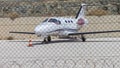 Prive Small Jet Plane Parked Behind Protected Barbed Wire . Editor Royalty Free Stock Photo