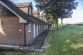 Row of chalet style accomodation at country rural hotel