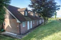 Row of chalet style accomodation at country rural hotel