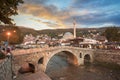 Old stone bridge and old Ottoman Sinan Pasha Mosque in Prizren, Kosovo