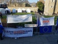 Pro-Brexit protest with pro-Brexit posters and flags.