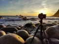 Pro camera on a tripod taking a photo of a sunset in the uk Royalty Free Stock Photo