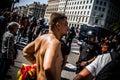 A pro catalan independence in front of police cordon