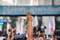 Pro-democracy protesters a three finger salute to show symbolic gestures