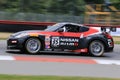 Pro Nissan 370Z race car on the course Royalty Free Stock Photo