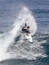 Pro Surfer Kalani Chapman surfing in Hawaii Royalty Free Stock Photo