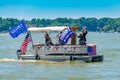 Pro Trump Boat Parade pontoon boat filled with people supporting President Trump