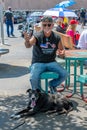 Pro Trump Boat Parade A senior Trump Supporter with his dog