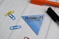 Probability write on sticky notes isolated on office desk