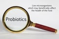 Probiotics Concept and Magnifying Glass