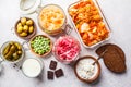 Probiotics food concept. Kimchi, beet sauerkraut, sauerkraut, cottage cheese, peas, olives, bread, chocolate, kefir and pickled Royalty Free Stock Photo