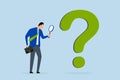 Problem analysis, trader analyst using magnifying glass to analyze question mark symbol Royalty Free Stock Photo
