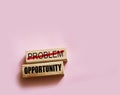 Problem crossed out and opportunity on wooden blocks. Business startup concept Royalty Free Stock Photo