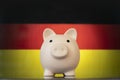 The problem is in the economy. economic crisis. Saving money concept. Piggy bank with Germany Flag Royalty Free Stock Photo