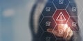 Problem and error warning concept. Businessman touching on triangle caution warning sign